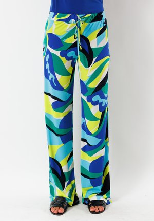 Pantaloni a gamba larga colorati e stampati con un design blu, verde, giallo e nero. Realizzati in un tessuto leggero e elasticizzato con una vita elastica.