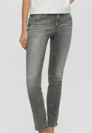 Jean en denim gris présentant une coupe slim, un léger effet vieilli, une taille mi-haute et un design classique à cinq poches. Matière en coton avec une légère élasticité.