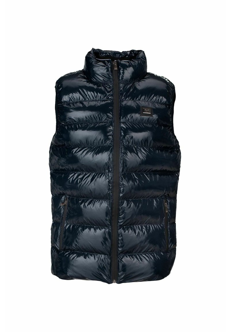 Chaleco acolchado azul marino con collar alto, textura brillante, cremallera frontal y dos bolsillos laterales. Presenta secciones acolchadas horizontales y un logo.