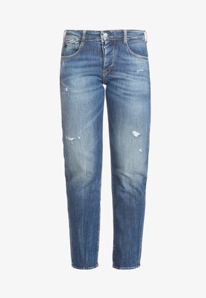 Blauwe spijkerbroek van denim met een vervaagde wassing en versleten details. Rechtestrijke ontwerp met vijf zakken en metalen knoopsluiting.