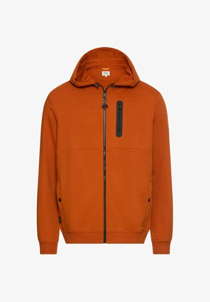 Orange hoodie med frontlynlås, to sidelommer, en sort lynlåse accent på brystet, samt ribbede manchetter og nederkant. Blød stoftekstur.