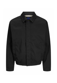 Veste décontractée noire avec col, fermeture à boutons sur le devant, deux poches latérales et taille élastique, présentée sur fond blanc.