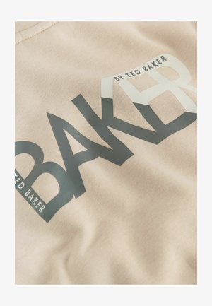 Helebeežikanga, millel on suur tumehall "BAKER" logo ja musta värvi väike tekst "by TED BAKER", esitades sujuvat tekstuuri ja puhta disaini.