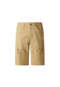 Beżowe szorty wykonane z lekkiego materiału, wyposażone w zasuwaną boczną kieszeń, przednie kieszenie oraz nadruk z logo na prawej nogawce.