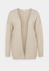 Beige öppen cardigan gjord av mjukt, lätt tyg med långa ärmar, lös passform och minimal sömdetalj längs mitten.
