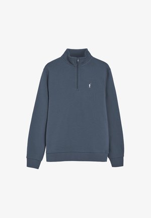 Marineblauwe fleece pullover met een hoge kraag, kwartrits en geribbelde mouwen. Heeft een klein wit logo op de linkerkant van de borst.