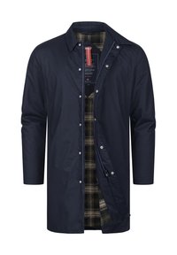 Merijalaman ulkoilu takki, jossa on napitettu etuosa ja pitkät hihat; sisältää ruutukuvioidun vuoren mustan ja beige sävyissä.