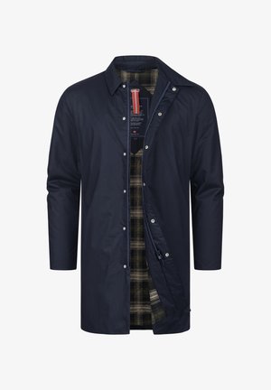 Mørkeblå ytterjakke med knappest closure og lange ermer; har et rutete fôr i nyanser av svart og beige.