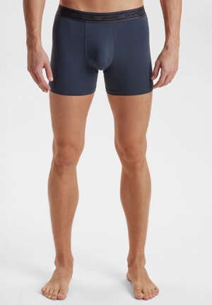 Herre navy blå boxershorts med en tætsiddende design, elastisk talje mærket 'DOVRE,' og en glat bomuldsagtig tekstur.