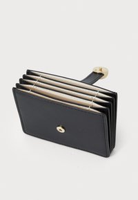 Black leather wallet with a compact design, featuring multiple card slots, a gold snap closure, and a small wrist strap.