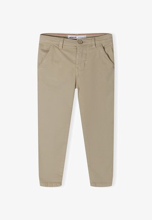 Beige børne-casualbukser med knaplukning, bæltestropper, sidelommer og syninger, lagt fladt på en hvid baggrund.