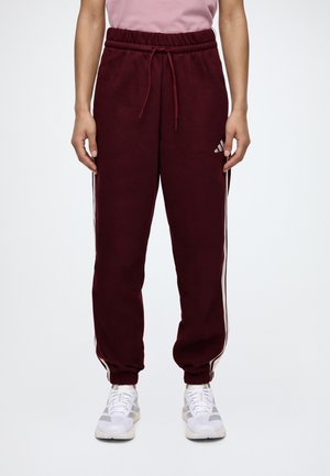 adidas Sportswear, ESSENTIALS 3 STRIPES CUFFED PANTS - Долнище на анцуг - maroon/white