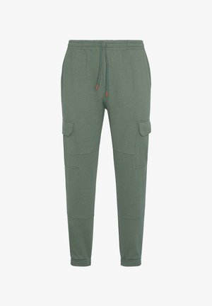 Grüne Baumwoll-Jogginghosen mit elastischem Bund, verstellbarem Kordelzug und zwei Cargo-Taschen an den Seiten. Glatte Textur, schmaler Schnitt.