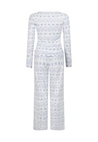 Piżama z długim rękawem w kolorze białym z niebieskim wzorem kwiatowym. Miękka tkanina, dopasowany góra i szerokie spodnie. Prosty okrągły dekolt.
