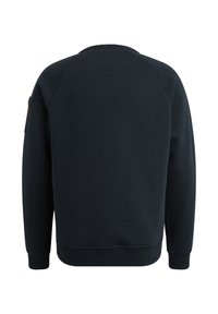 Donkerblauwe sweatshirt met een ronde hals, ribbels aan de mouwen en onderkant. Beschikt over een zak op de linker mouw en een gladde, gestructureerde stof.