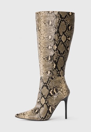 Knee-high stiletto boot with pointed toe and beige-black snakeskin pattern, shown from side on plain background.