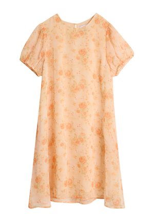 Blomstermønstrete kjole i lys fersken med korte pufferm, rund hals og baknøkkeldetalj. Laget av lett, teksturert stoff.