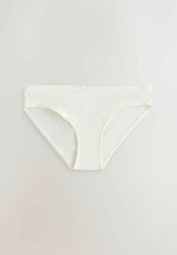Culotte féminine style bikini blanche avec un petit nœud décoratif au centre de la taille sur un fond uni.