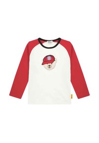 Long-sleeve T-shirt with red raglan sleeves and a white body, featuring an embroidered bear wearing a red cap with a logo on the chest.