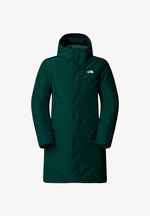 Langer grüner Puffercoat mit hohem Kragen und angenhmützer Kapuze. Verfügt über einen Reißverschluss, seitliche Taschen und ein Logo auf der linken Brust.