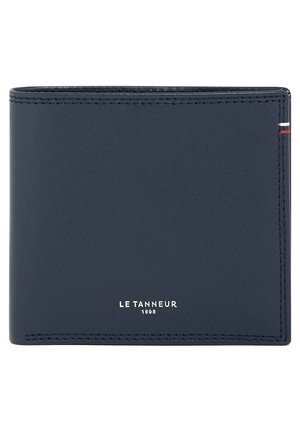 Navy blue leather wallet with a smooth texture, bi-fold design, and white embossed branding. Features contrast stitching and a vertical stripe accent.