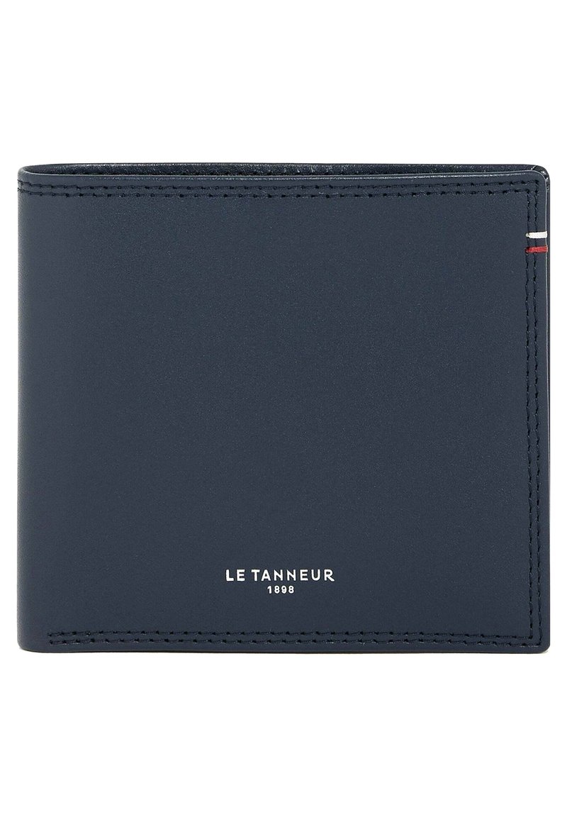 Navy blue leather wallet with a smooth texture, bi-fold design, and white embossed branding. Features contrast stitching and a vertical stripe accent.