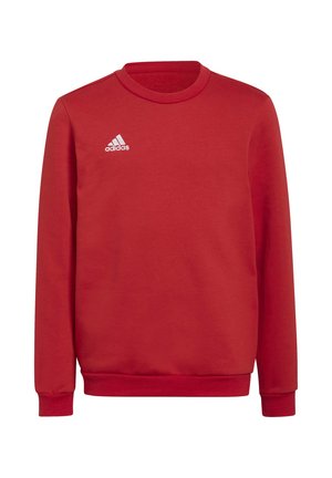 Felpa rossa realizzata in tessuto morbido, con maniche lunghe, un colletto tondo e il logo bianco di Adidas sul lato sinistro superiore.