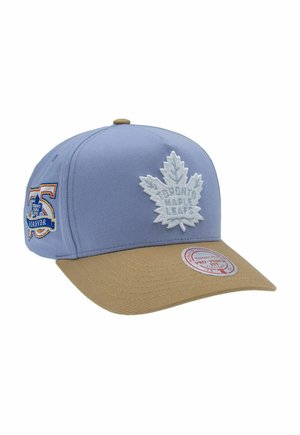Light blue and tan baseball cap with white embroidered Toronto Maple Leafs logo on front and 75th anniversary patch on side.