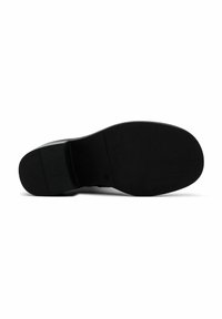 Black shoe sole with a smooth surface, curved heel, and distinct tread pattern; made of rubber with a durable finish.