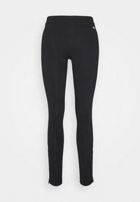 Svarta leggings tillverkade av elastiskt material, med hög midja och en liten logotyp på höfterna. Slät yta och åtsittande design.