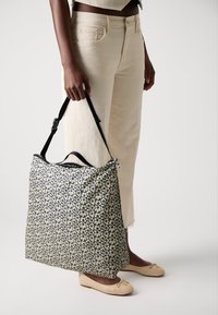 Marimekko - NEAT CROSSBODY UNISEX - Cross body bag - dark navy/off white Thumbnail Image 1