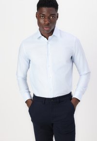 Selected Homme SLHSLIM NEW MILES FLEX PANTS - Chinos - dark sapphire