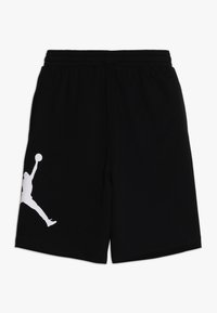 Svarta träningsshorts tillverkade av en bomullsblandning. Har ett elastiskt midjeband och en vit ikonisk logotypgrafik på vänster sida.