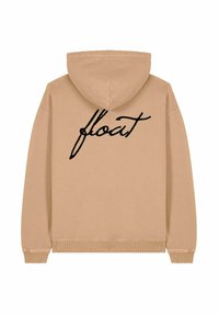 Felpa color beige con cappuccio regolabile e polsini a coste. Sul retro è ricamata a mano la parola "float" in nero.
