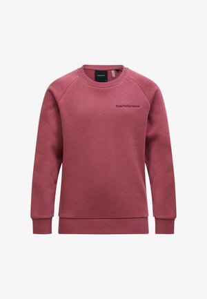 Sweat-shirt à manches longues col rond couleur rose pâle avec poignets et ourlet côtelés, arborant un petit logo "Peak Performance" sur la poitrine gauche.