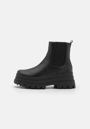 Platform ankle boots - black