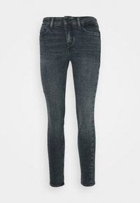 Jeans de mezclilla oscuros de corte slim, con cinco bolsillos, cierre de botón y pasadores para cinturón. Textura suave con un ligero desgaste en la parte frontal.