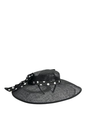 Sort nethat med bred skygge, dekoreret med et sort- og hvidprikket bånd og en sløjfe bundet i siden.