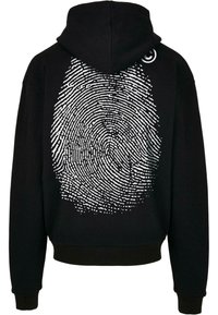 Black hoodie featuring a large white fingerprint graphic on the back. Soft fabric with a fitted hem and ribbed cuffs. Simple round logo on shoulder.