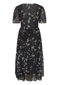 Rochie neagră transparentă cu motive florale albe, cu mâneci scurte pufoase și un design cu fuste în straturi. Prezintă o talie elastică pentru confort.