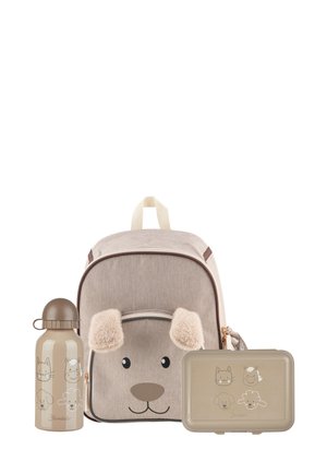 Beige Rucksack für Kinder mit Hundegesicht und Ohren, passender Lunchbox und Wasserflasche mit Illustrationen von Katze, Pferd, Hund und Schaf.
