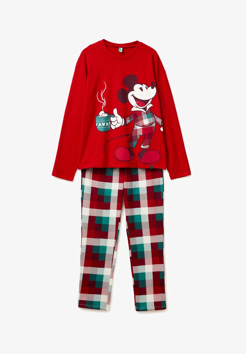 Top rosso a maniche lunghe con grafica di un personaggio dei cartoni animati che tiene una bevanda. Pantaloni a quadri abbinati in tonalità rosse, verdi e bianche.