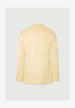 Blazer in lino giallo chiaro con design strutturato, vestibilità su misura, colletto a ribalta e schiena con spacchi. Presenta maniche lunghe e dettagli minimalisti.
