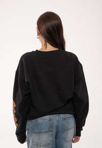 Paradiso Clothing AC DC HIGHWAY TO HELL - Sweatshirt - black