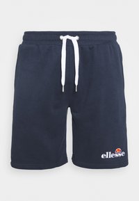Short bleu marine en coton avec cordon blanc et logo ellesse sur la partie inférieure gauche de la jambe, taille élastique et poches latérales.