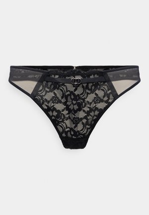 Černé krajkové tangá s květinovým vzorem, průhledné síťované strany a centrální stříbrný kroužek. Měkká tkanina s elastickým pasem pro pohodlí.