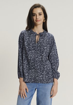 Bluse mit maritimem Blumenmuster, langen Ärmeln, Schlüsselloch-Ausschnitt und Raffung. Hergestellt aus weichem Stoff mit lockerer Passform.
