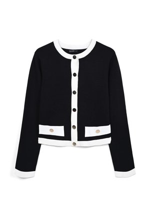 Black cropped cardigan with white accents, featuring a round neckline, button front, and two horizontal pockets with metallic buttons.