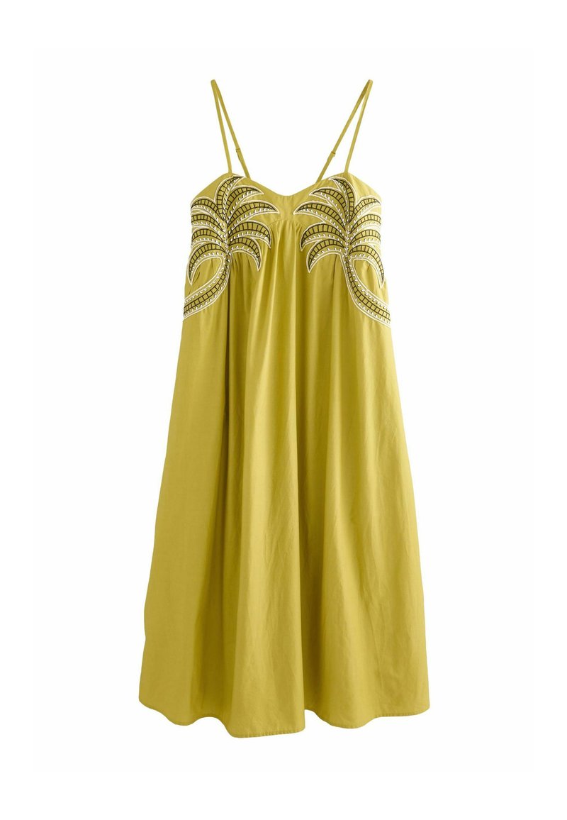 Robe jaune sans manches avec des bretelles fines. Présente des motifs de palmiers brodés avec des accents de perles sur le corsage. Tissu fluide avec une coupe décontractée.