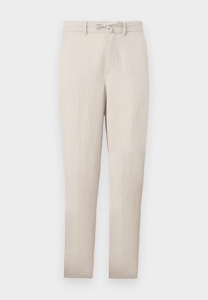 Pantaloni beige leggeri a gamba affusolata con vita regolabile, frontale piatto e minime pieghe. Presentano passanti per cintura e tasche laterali.